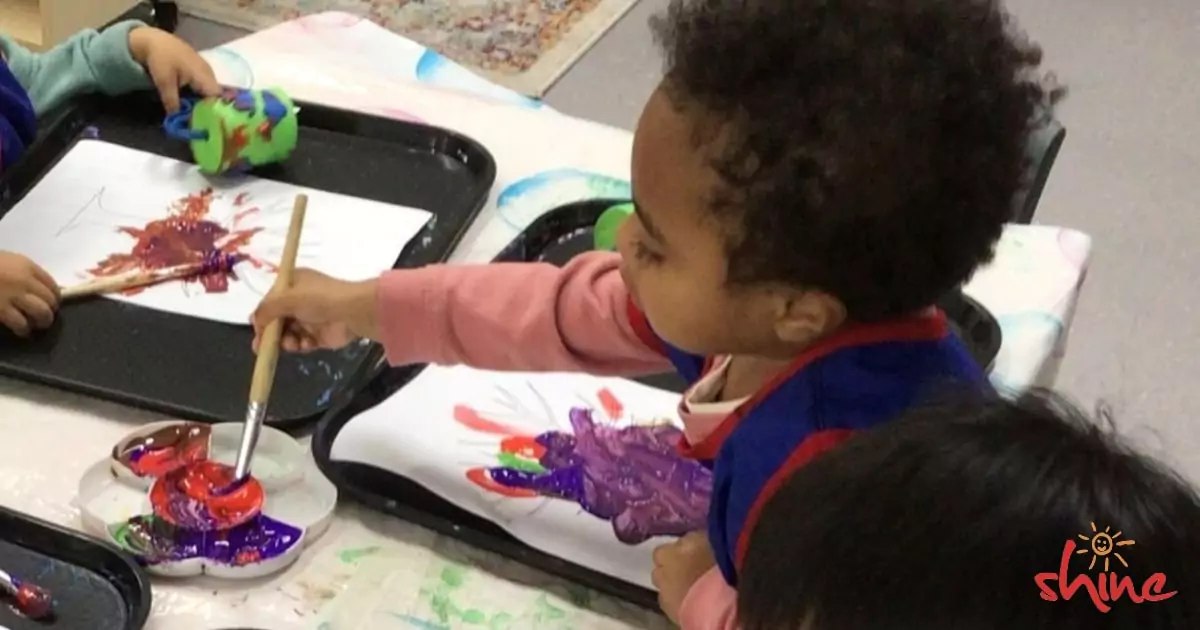 Children expressing creativity through art